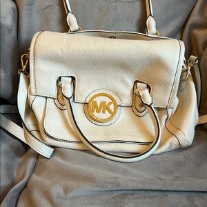 Michael Kors Cream Leather Satchel with cross body strap.